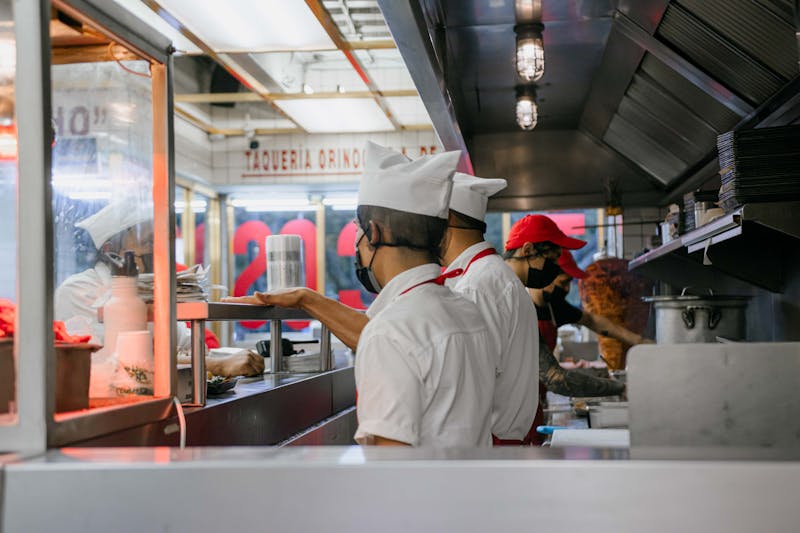 Piada prep team in the morning preparing fresh ingredients for the day